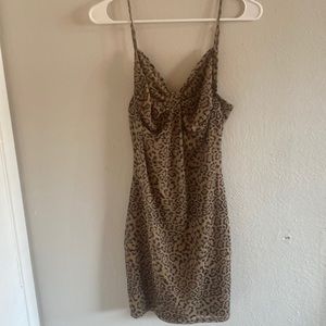Beautiful Dress Size Large Color Tan and black.